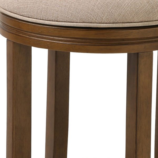 25" Cream And Brown Solid Wood Swivel Backless Counter Height Bar Chair - Image 4
