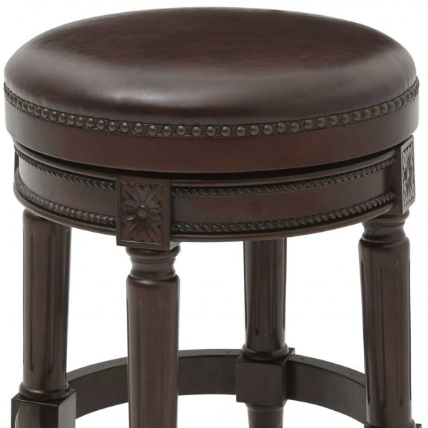 26" Dark Brown And Wood Brown Faux Leather Swivel Backless Counter Height Bar Chair - Image 4