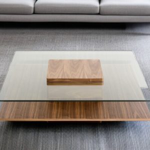 39" Clear and Brown Glass and Wood Pedestal Coffee Table With Shelf