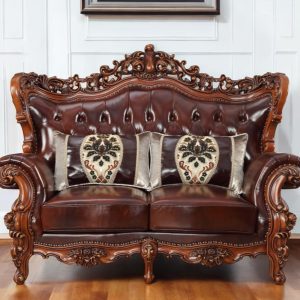 69" Brown And Walnut Top Grain Leather Curved Loveseat and Toss Pillows