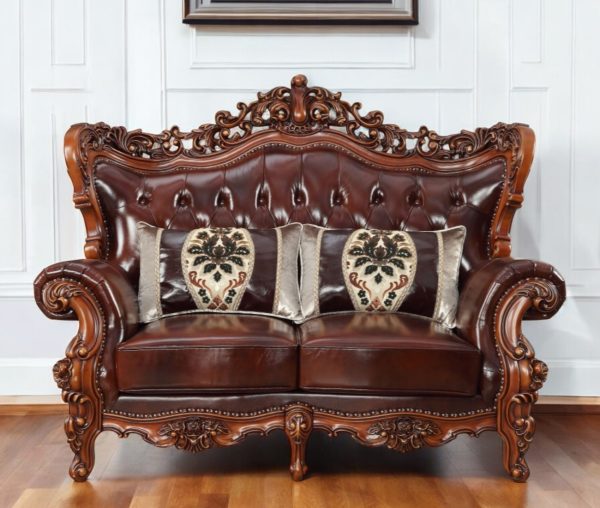 69" Brown And Walnut Top Grain Leather Curved Loveseat and Toss Pillows