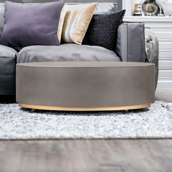 28" Gray And Brass Concrete And Brass Oval Coffee Table - Image 2