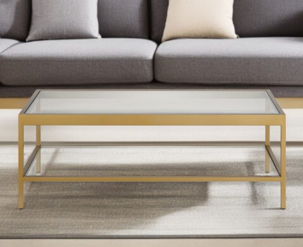 45" Clear Glass And Gold Steel Coffee Table With Shelf